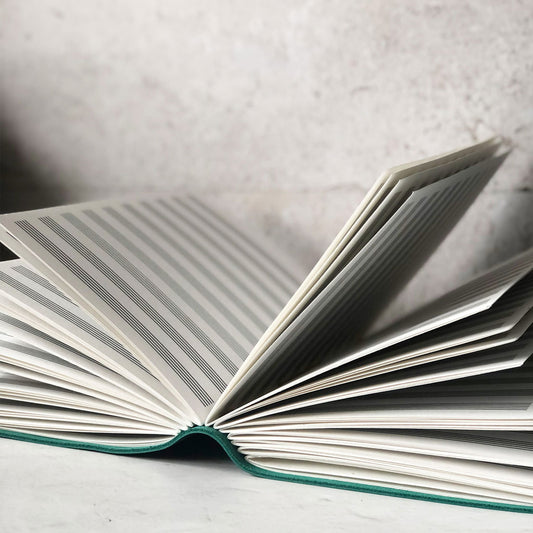 Sheet music writing journal open