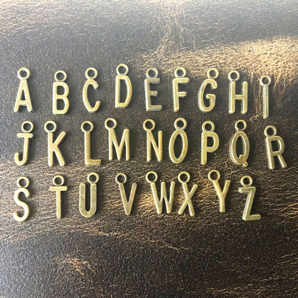 Bronze alphabet charm