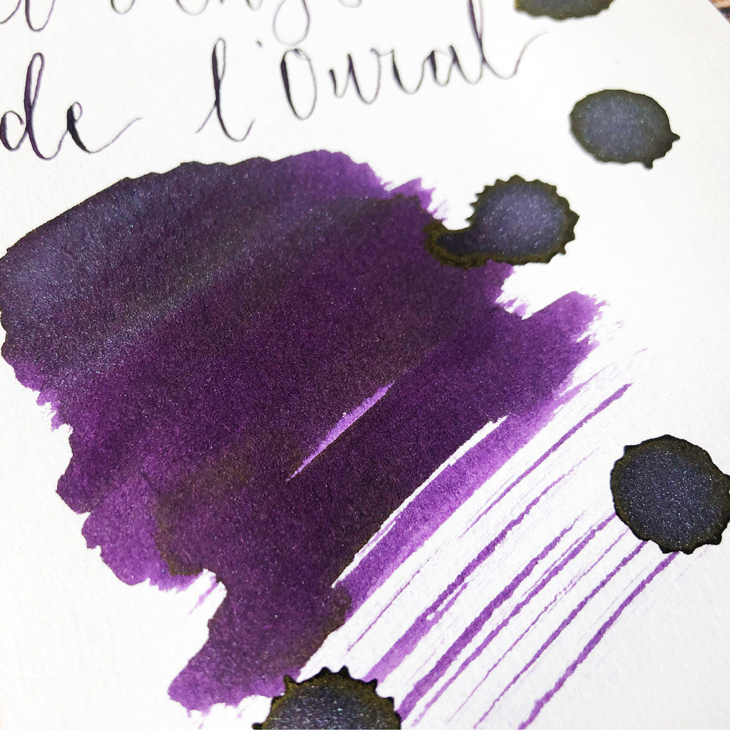 J Herbin Amethyste de l'Oural ink swatch close up on Indigo Artisans Cartridge paper