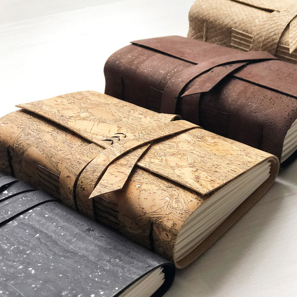 Brown, black, natural and white snake faux leather journals