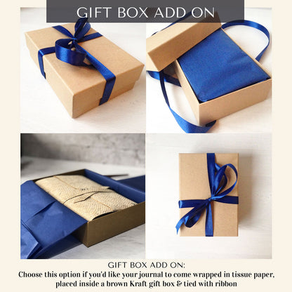 Brown Kraft gift box with blue ribbon and tissue paper on a white background