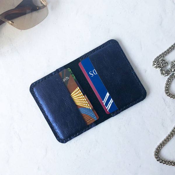 Metallic blue leather card wallet open