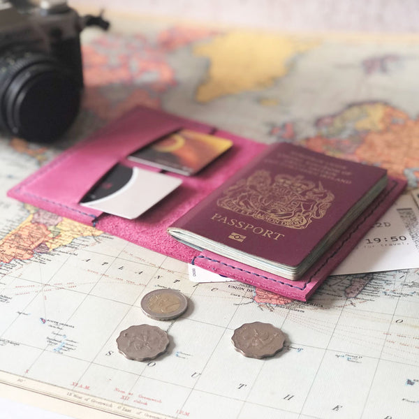 Pink leather passport cover with card slots