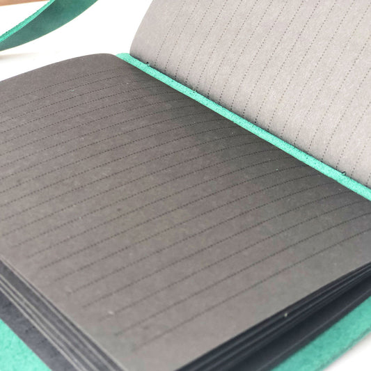 Lined black paper pages