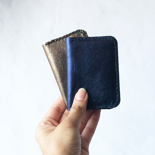 Metallic blue and burnished gold leather credit card holder