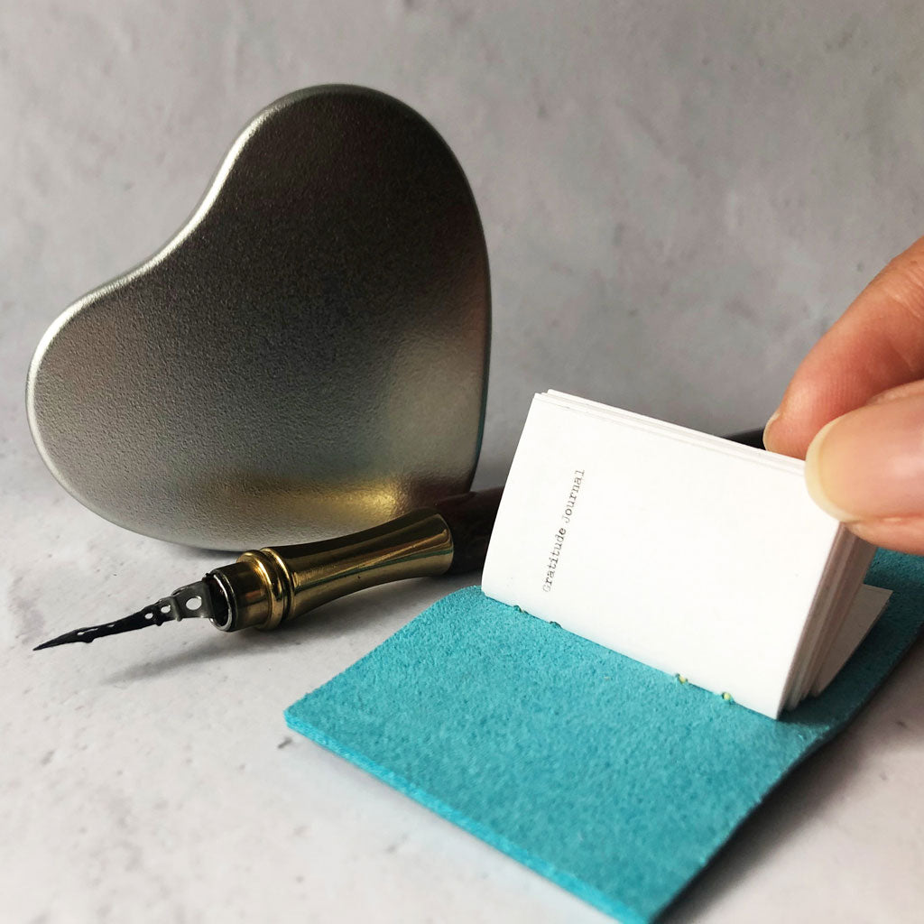miniature turquoise leather gratitude journal
