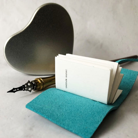 Gratitude journal with heart gift box